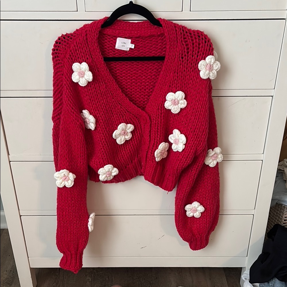 Luna Ivy red sweater with crochet flowers